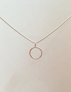 Circle - Sterling silver pendant on 16 inch snake chain